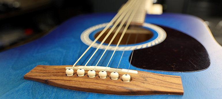 Entretien, réparation et ajustement de guitares acoustiques & classiques sur la rive-sud